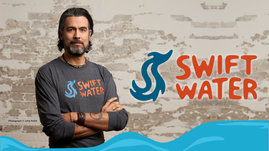 A digital graphic features photo of author/editor David A. Robertson, a Cree man with dark shoulder length hair and a beard. Next to David is the new Swift Water logo. 